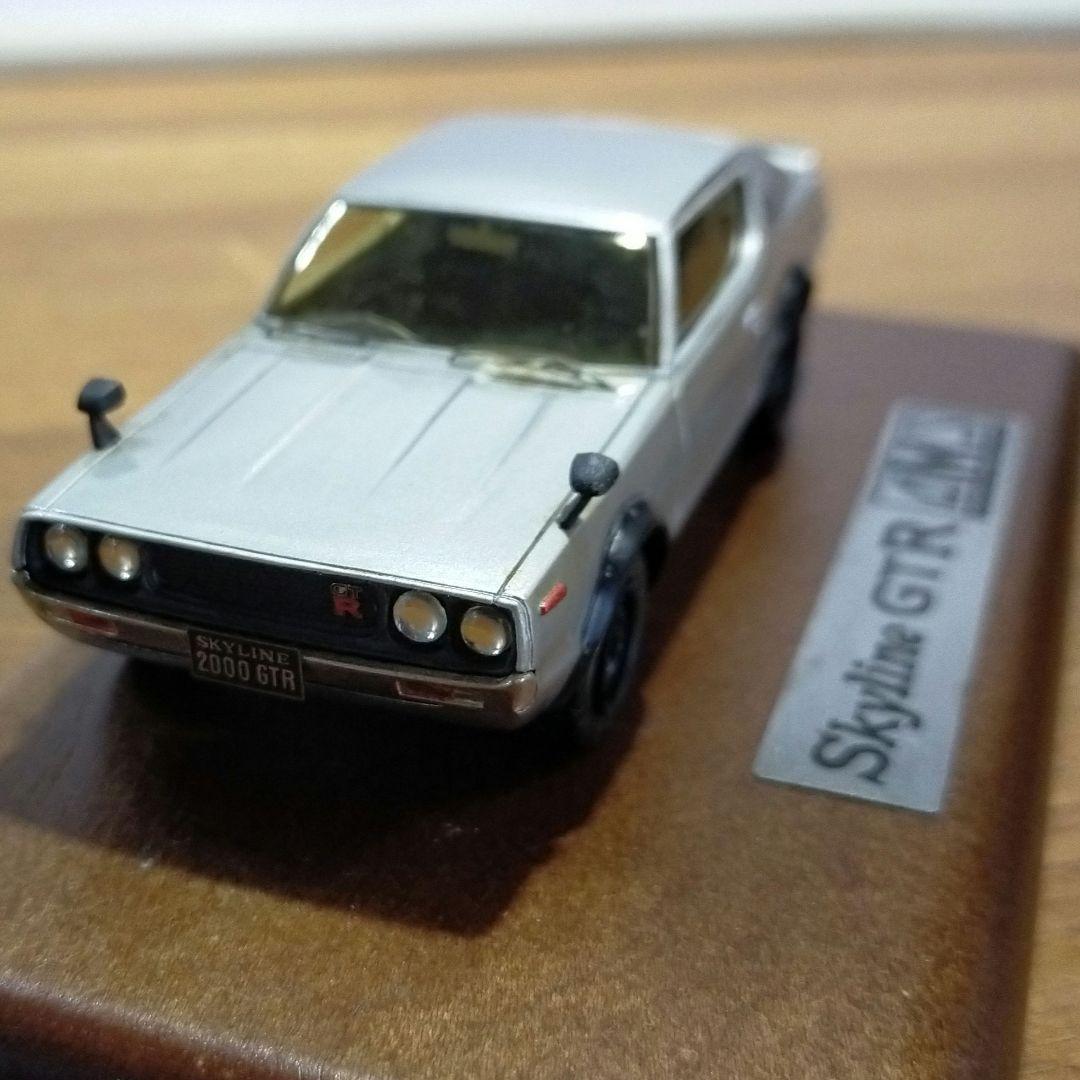 《新品箱付》1:64 GMC サバナ　ミニカー AMS ニッサンSKYLINE GT-R KPGC-100 77/197（CLAUDIUS SIMOND