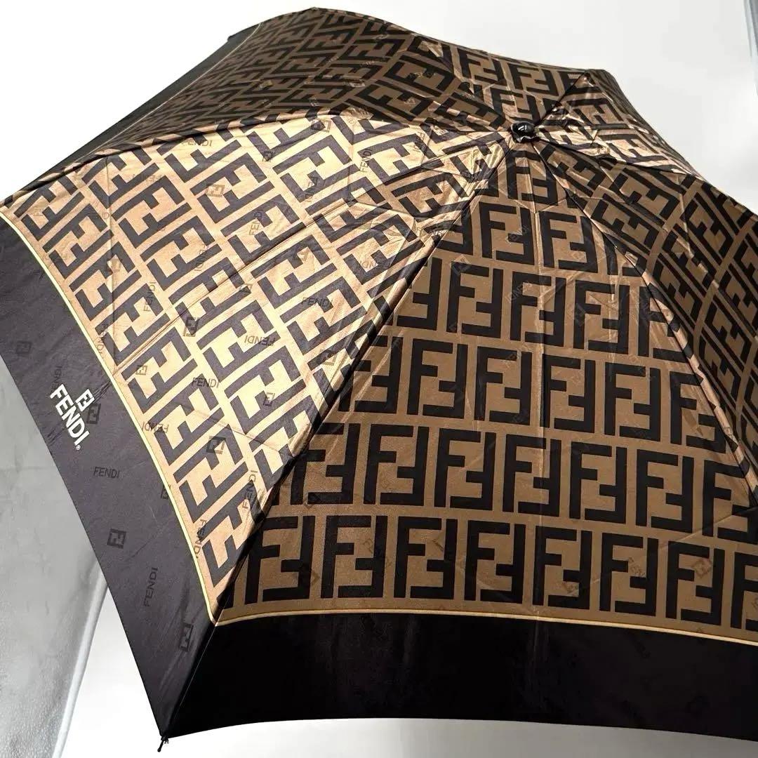 未使用級 FENDI 折りたたみ傘 ズッカ ゴールド金具 収納袋付 ムーンバット 未使用級 FENDI 折りたたみ傘 ズッカ ゴールド金具 収納袋付