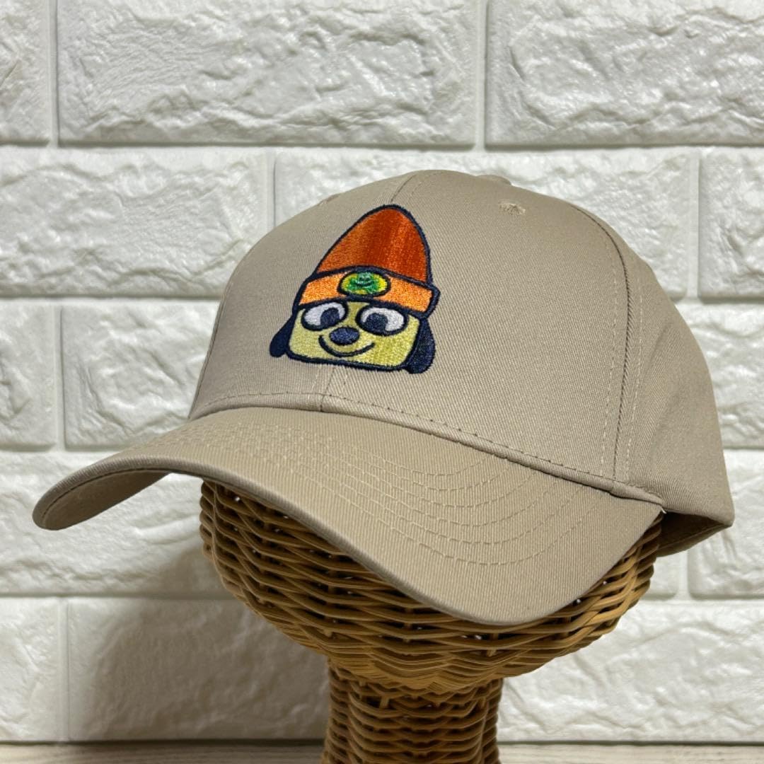 パラッパラッパー 大人用 キャップ ベージュ 顔 刺繍 帽子