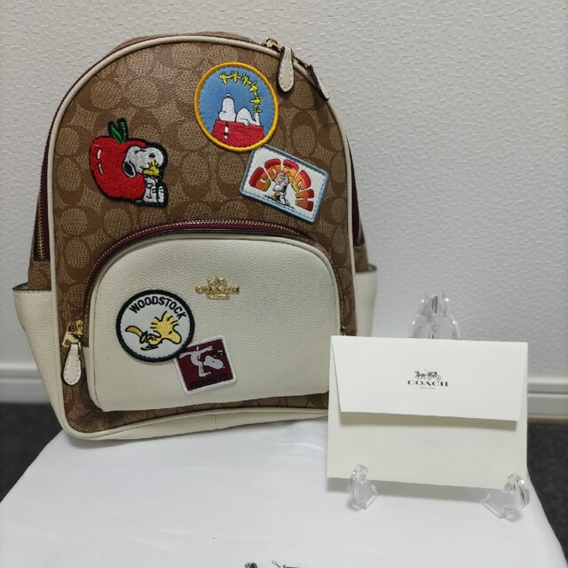 即日発送COACH コーチ スヌーピー コラボ リュック ブラウン ワッペン 新品タグ有】COACH コーチ スヌーピー コラボ リュック ワッペン