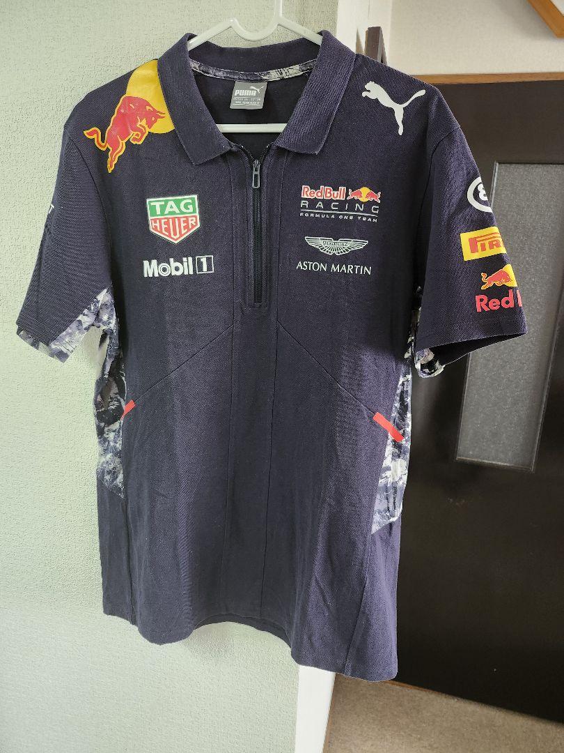 レッドブルの超かっこいいハーフジップのポロシャツUSサイズMです早い者勝ちです。 レッドブルの超かっこいいハーフジップのポロシャツUSサイズM